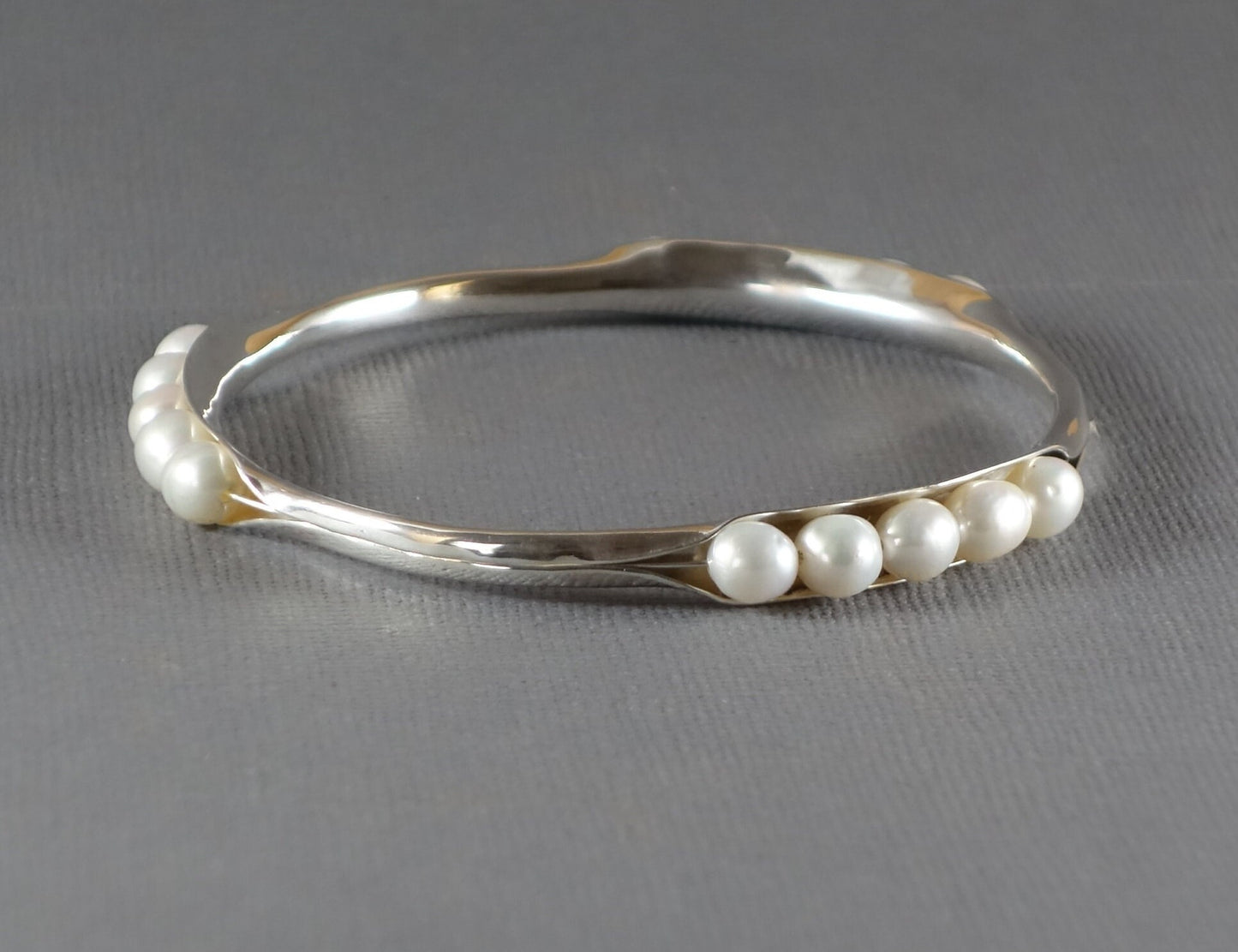 Anticlastic Bangle with White Pearls, Silver Bangle, 3 station
