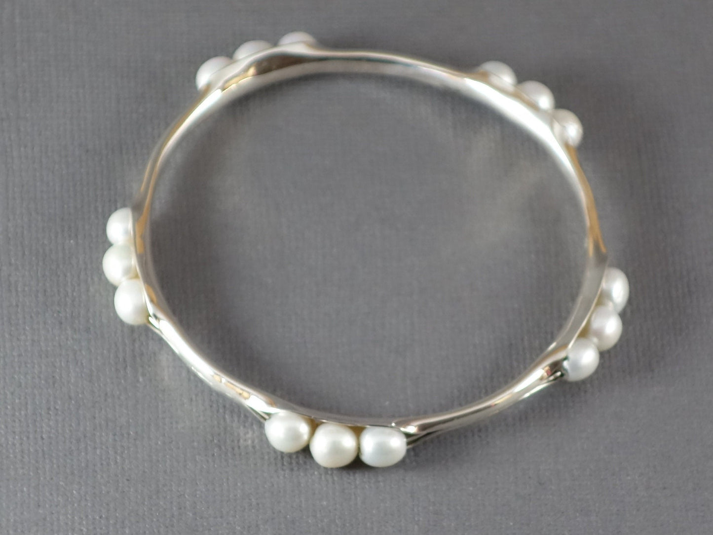 Anticlastic Bangle with White Pearls, Silver Bangle, 5 station